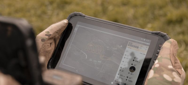Military personnel handling sensefly eBee tac artemis tablet