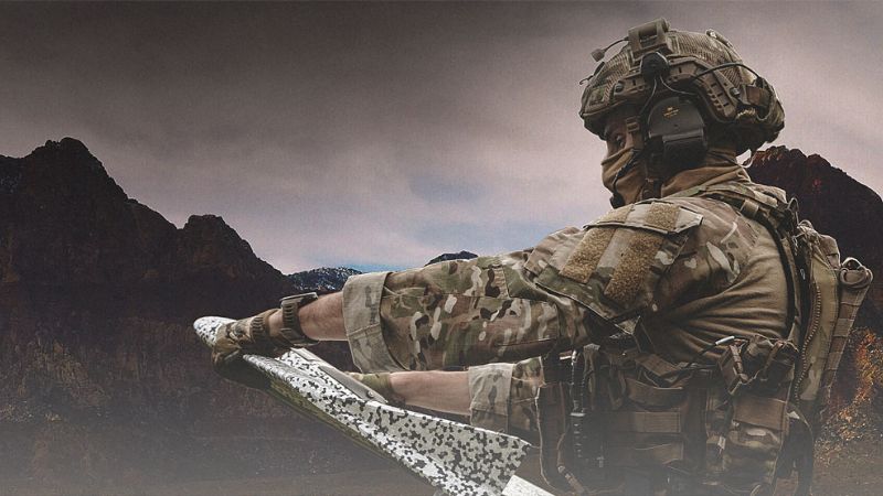 military personnel holding ebee tac